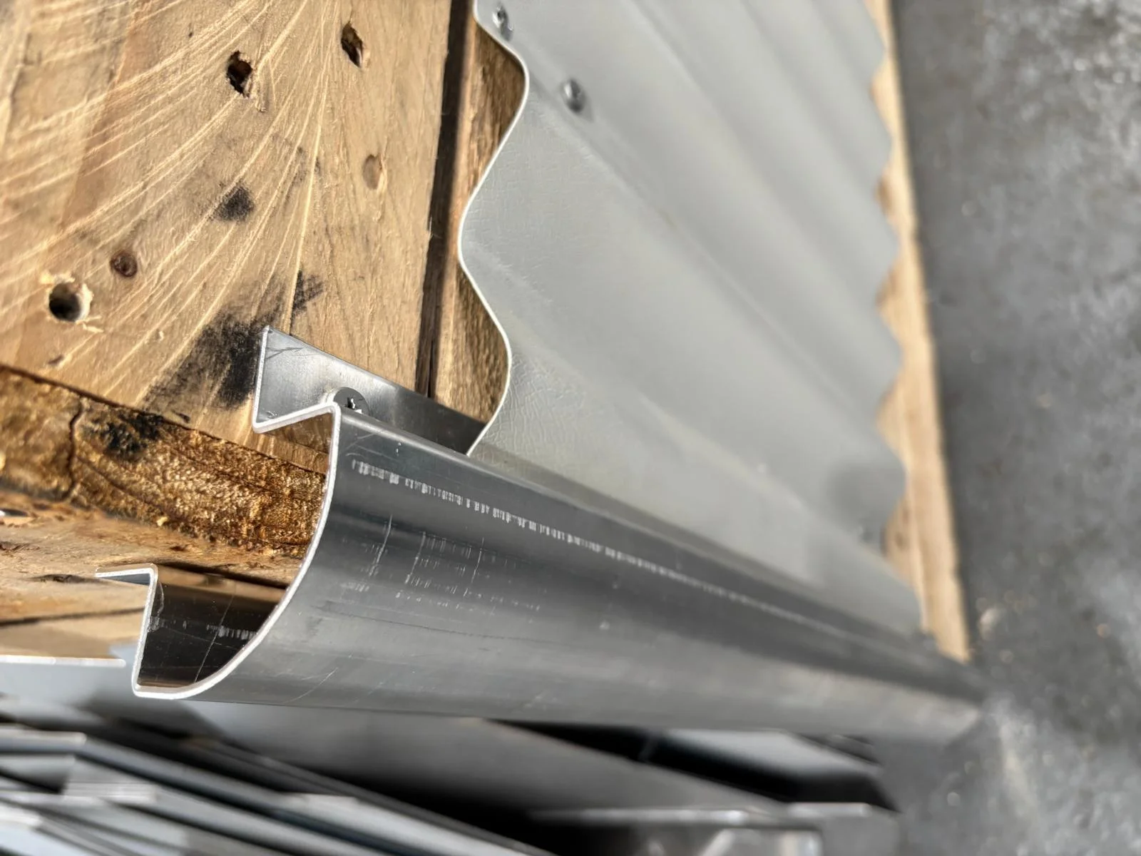 Corrugated wall sheet and corner flashing