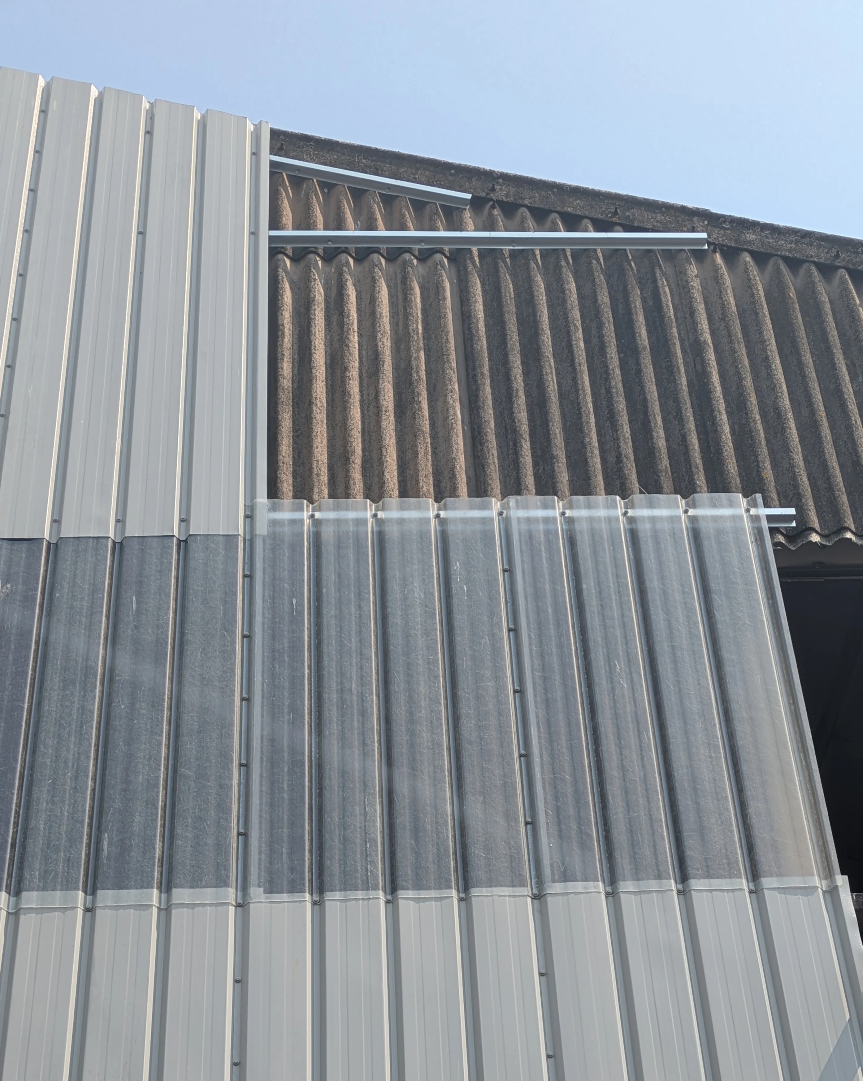 Cement asbestos overcladding